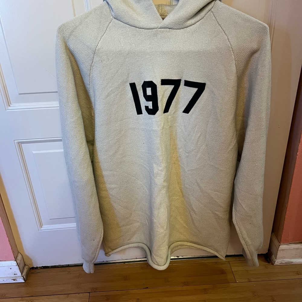 Essentials Cream Hoodie with Black '1977' Design